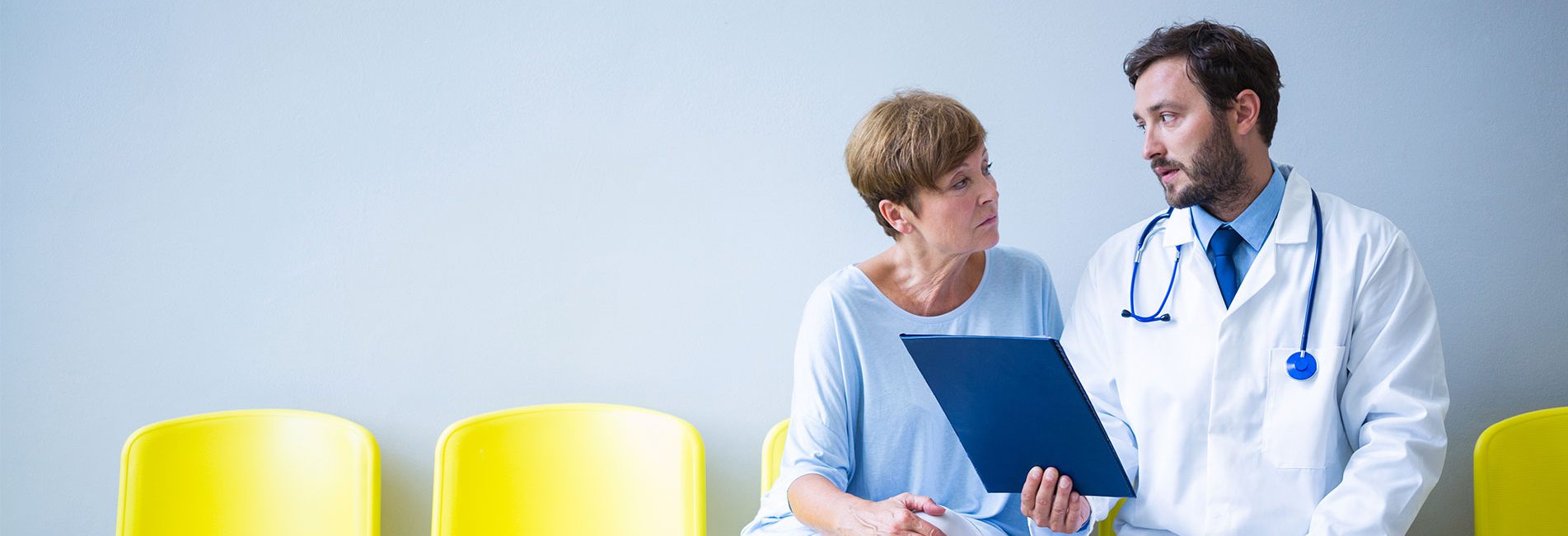 Patient talking to doctor at the heart clinic