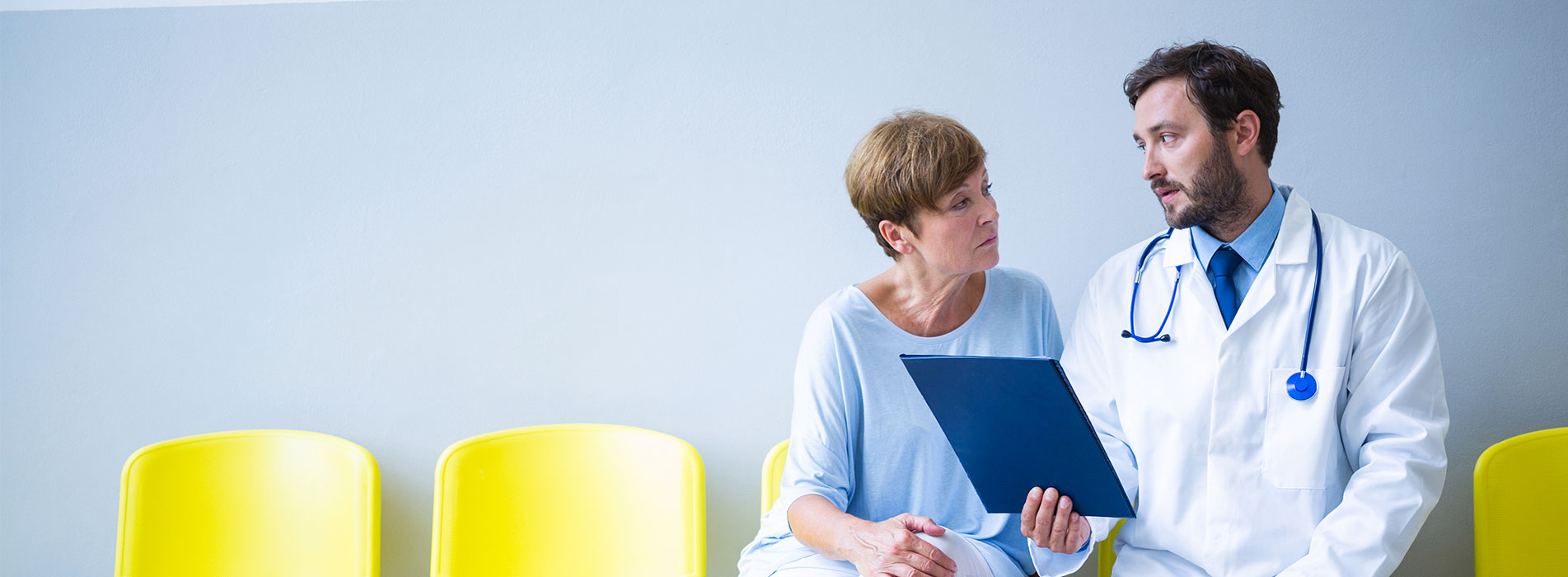 Patient talking to doctor at the heart clinic